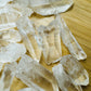 Alternate angle of Grade AA Lemurian Quartz point showing overall shape