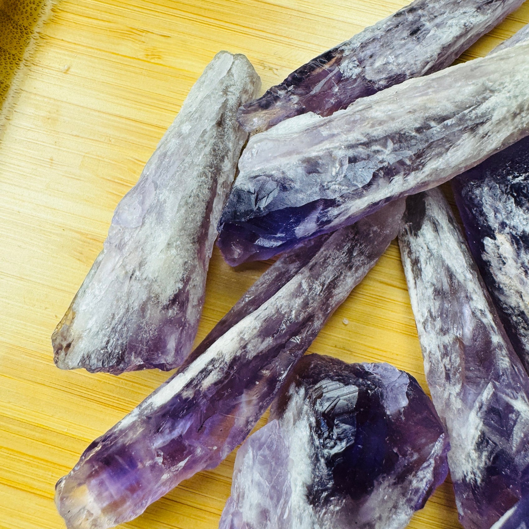 Overhead view of purple Amethyst raw point, showing untreated character.