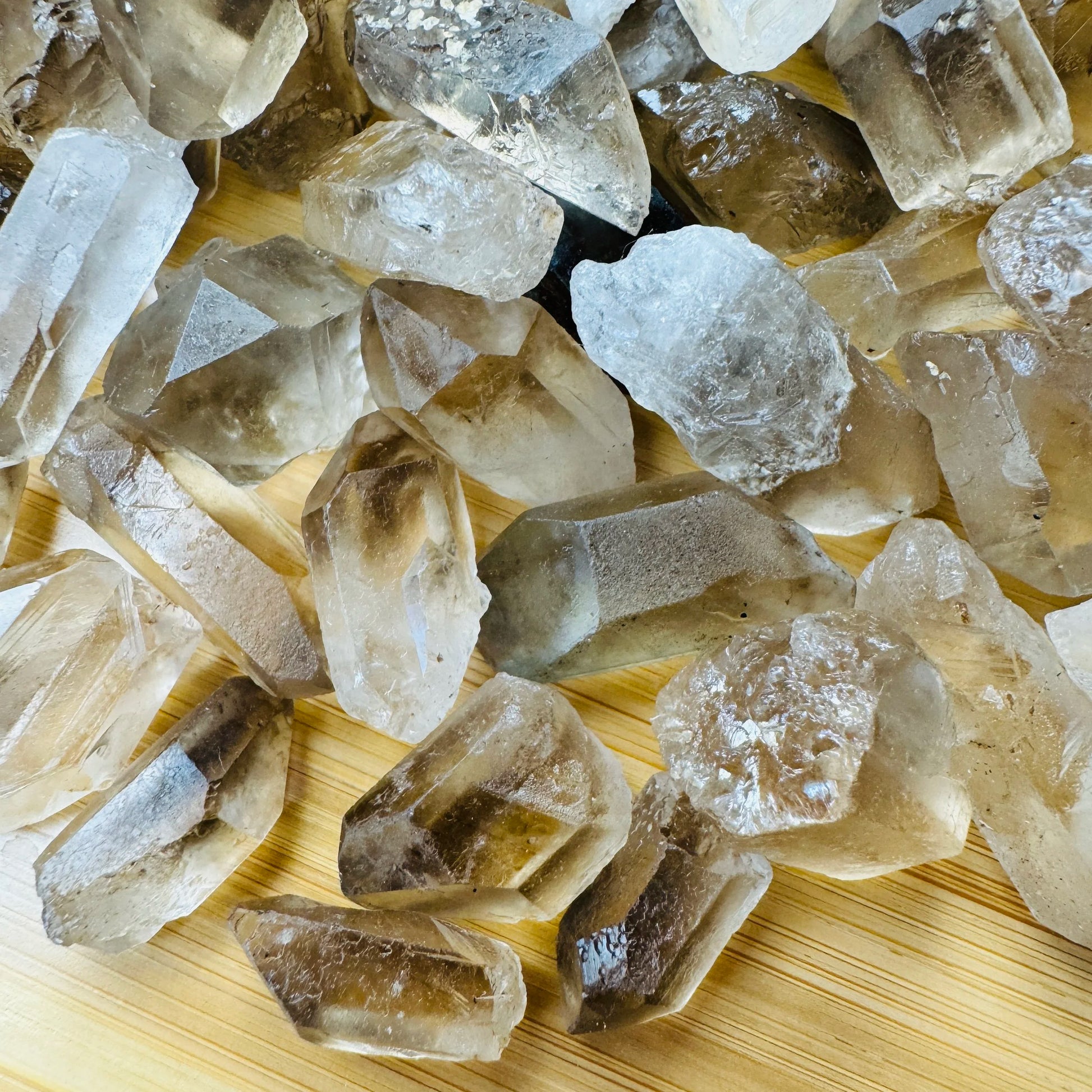 Macro view of Grade AA Smoky Quartz raw point, sourced from Brazil.