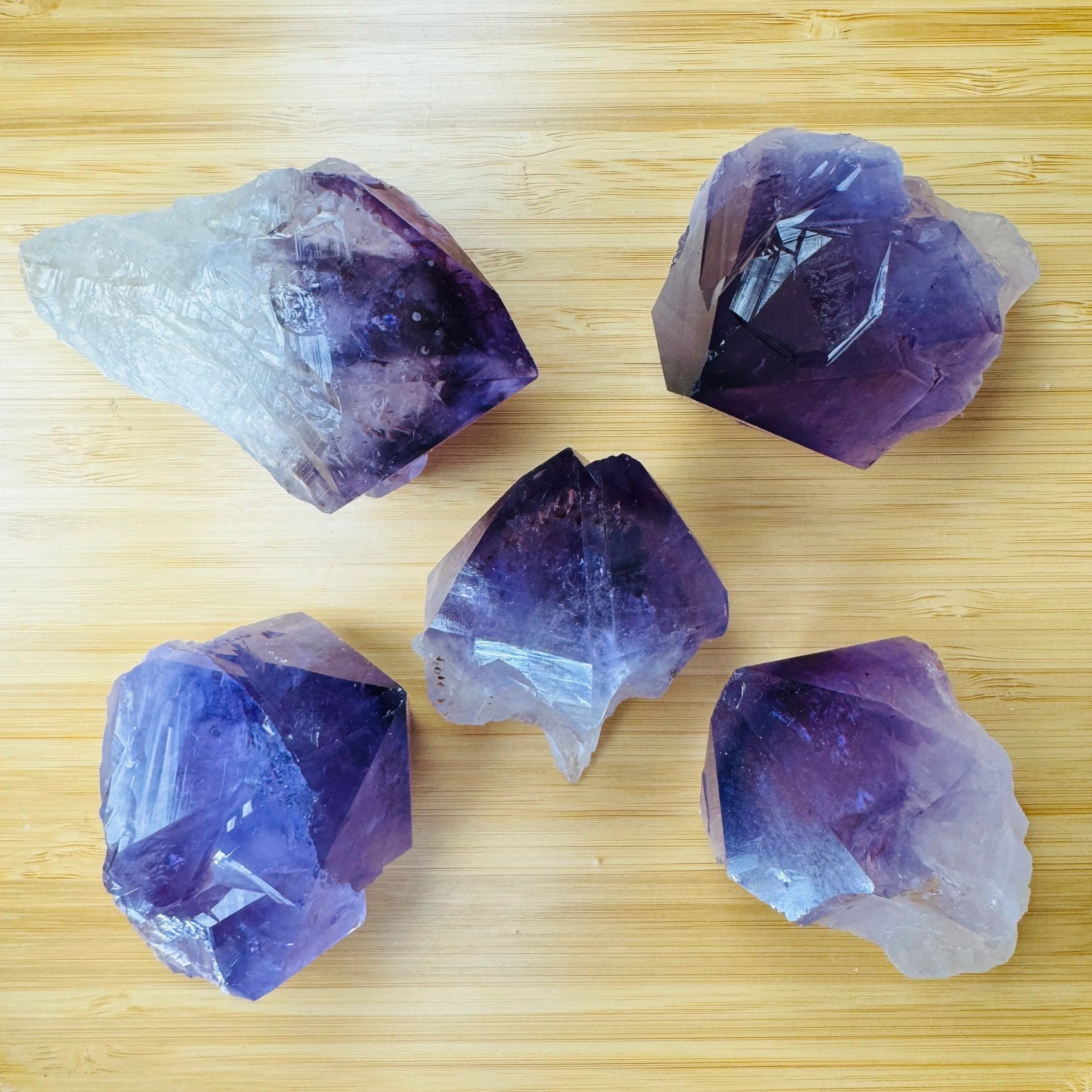 Side-on view of Amethyst raw point, associated with Stress Relief and Sleep, from Brazil.