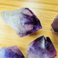 Bird's-eye view of Amethyst raw point, showing characteristic patterning, kept near for Stress Relief.
