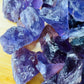 Alternate angle of Grade AA Amethyst raw stone, from Rio Grande do Sul, Brazil, kept near for Stress Relief.