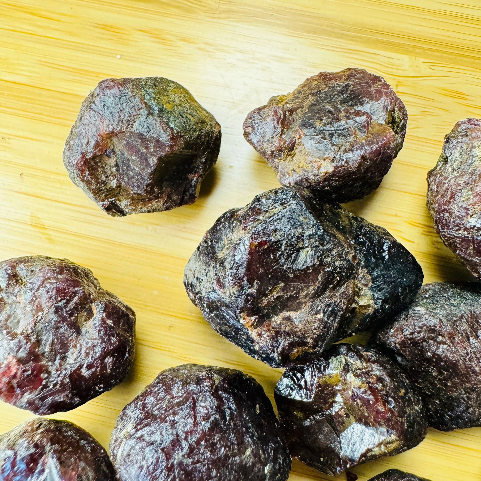 Back view of Garnet raw stone, often kept for Energy.