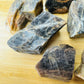Overhead view of Black Moonstone raw stone, showing untreated character.
