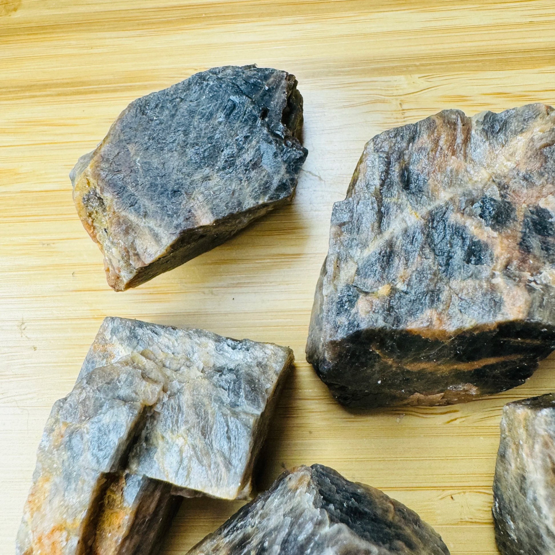 Bottom side of Black Moonstone raw stone, hand-selected from Amoron'i Mania, Madagascar, showing characteristic color.