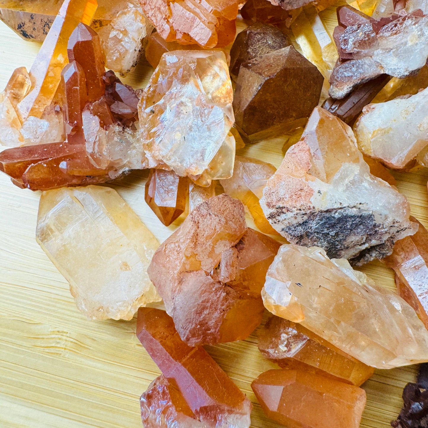 Detail shot of Grade AA Tangerine Quartz point under natural light