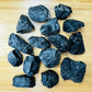 Detail shot of Grade A Black Tourmaline raw under natural light