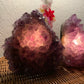 Detail shot of Grade A Amethyst polished crystals & decor under natural light