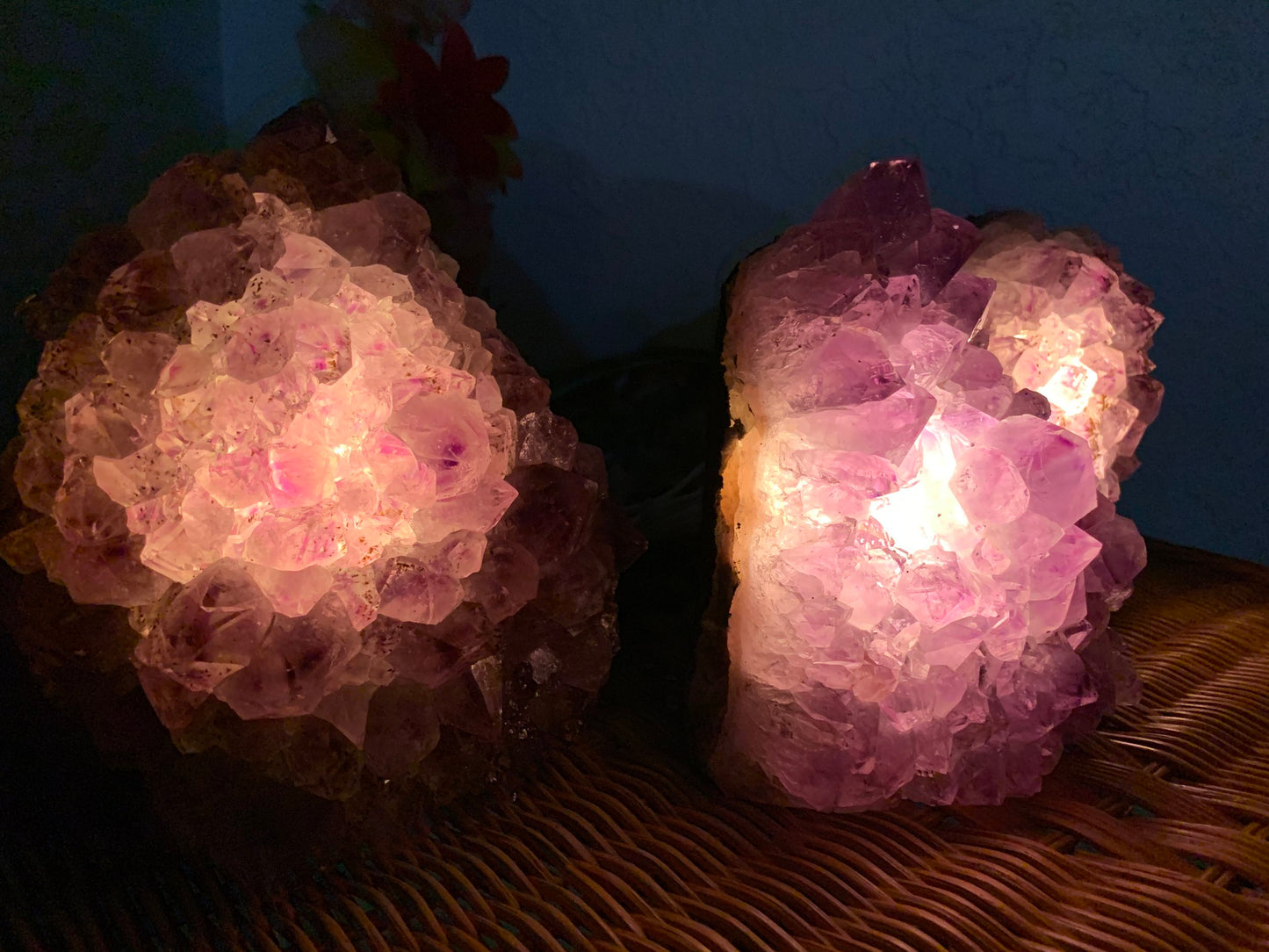 Scale reference of a Amethyst crystal lamp held against natural backdrop, from Brazil.