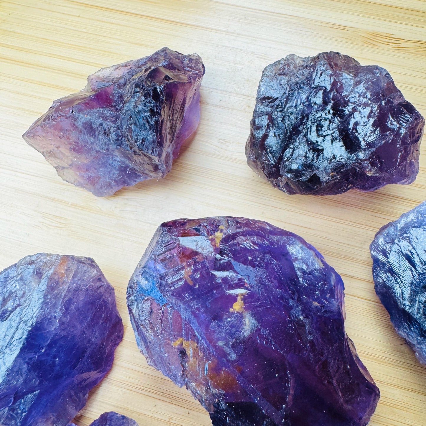 Alternate side of Amethyst raw stone, hand-selected from Rio Grande do Sul, Brazil, often kept for Stress Relief.