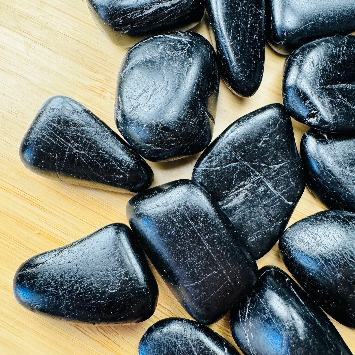Black Tourmaline tumbled stone from Brazil with Black color, polished finish for mindful calm