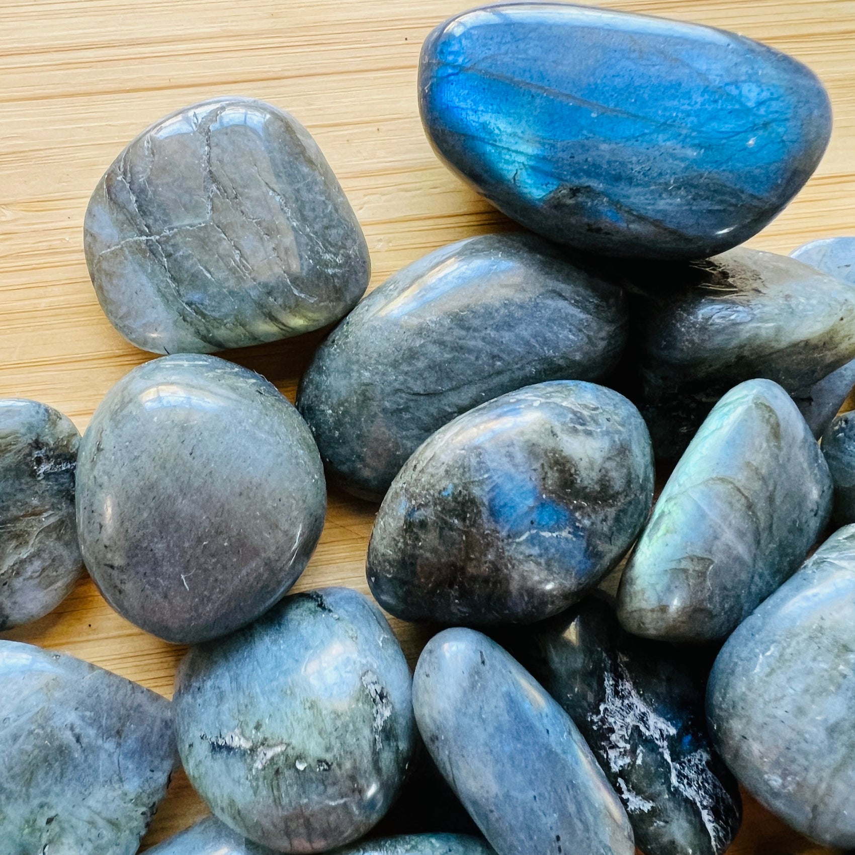 Back view of Grade AA Labradorite tumbled stone, hand-selected from Atsimo-Andrefana, Madagascar, drawn on for Intuition.