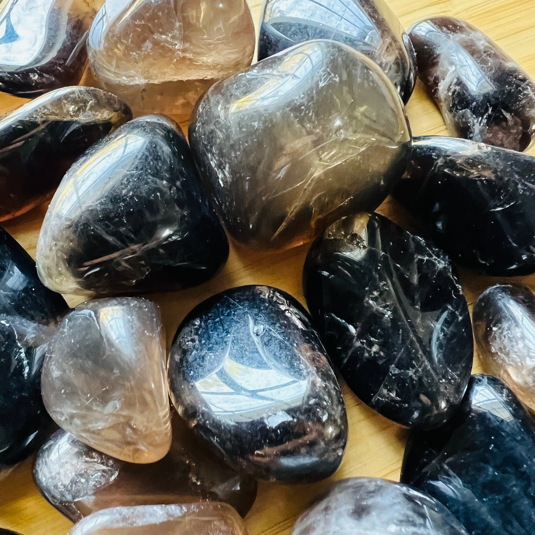 Alternate side of Smoky Quartz tumbled stone, hand-selected from Vakinankaratra, Madagascar, showing matte finish.