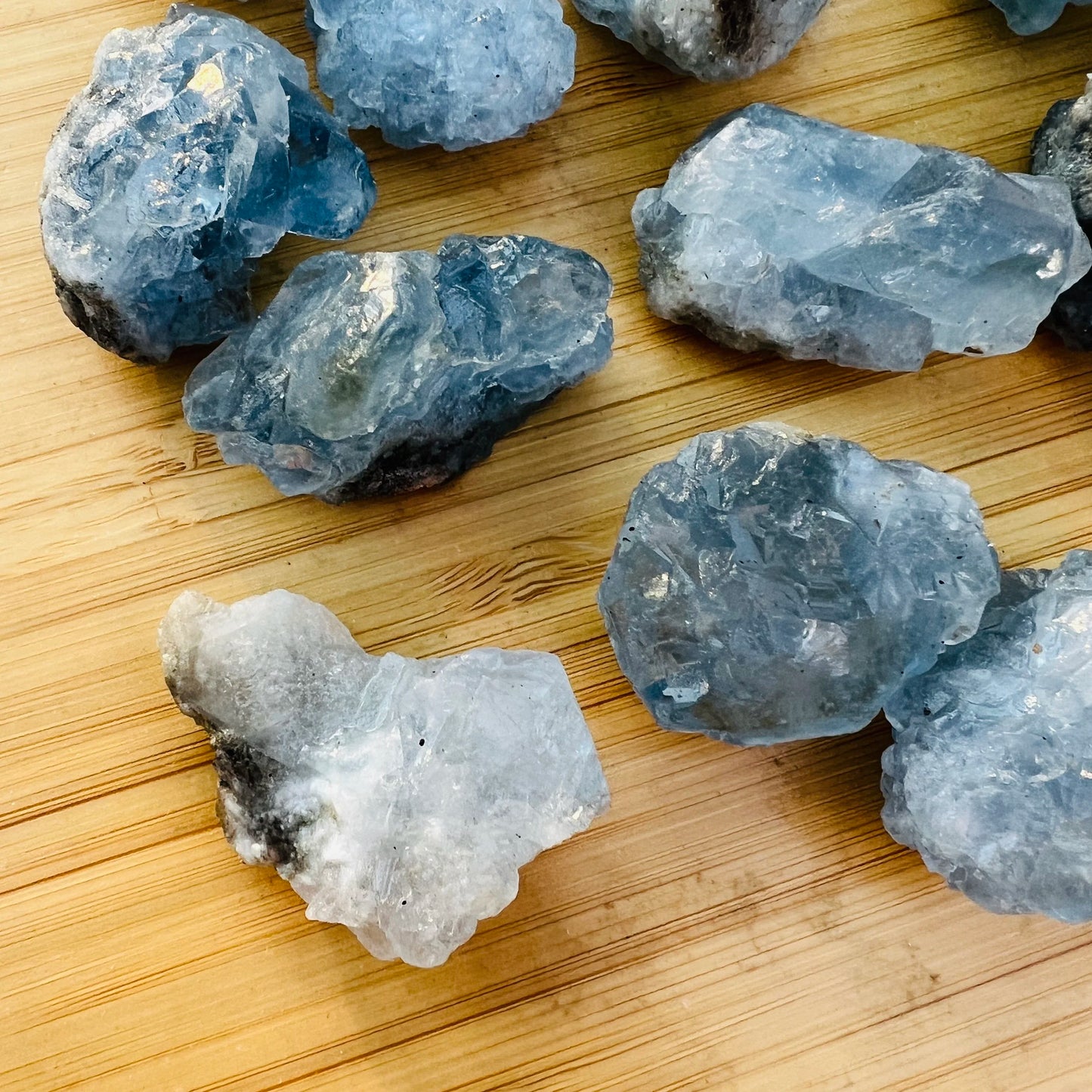 In-hand view of a single Celestite raw stone from Madagascar.