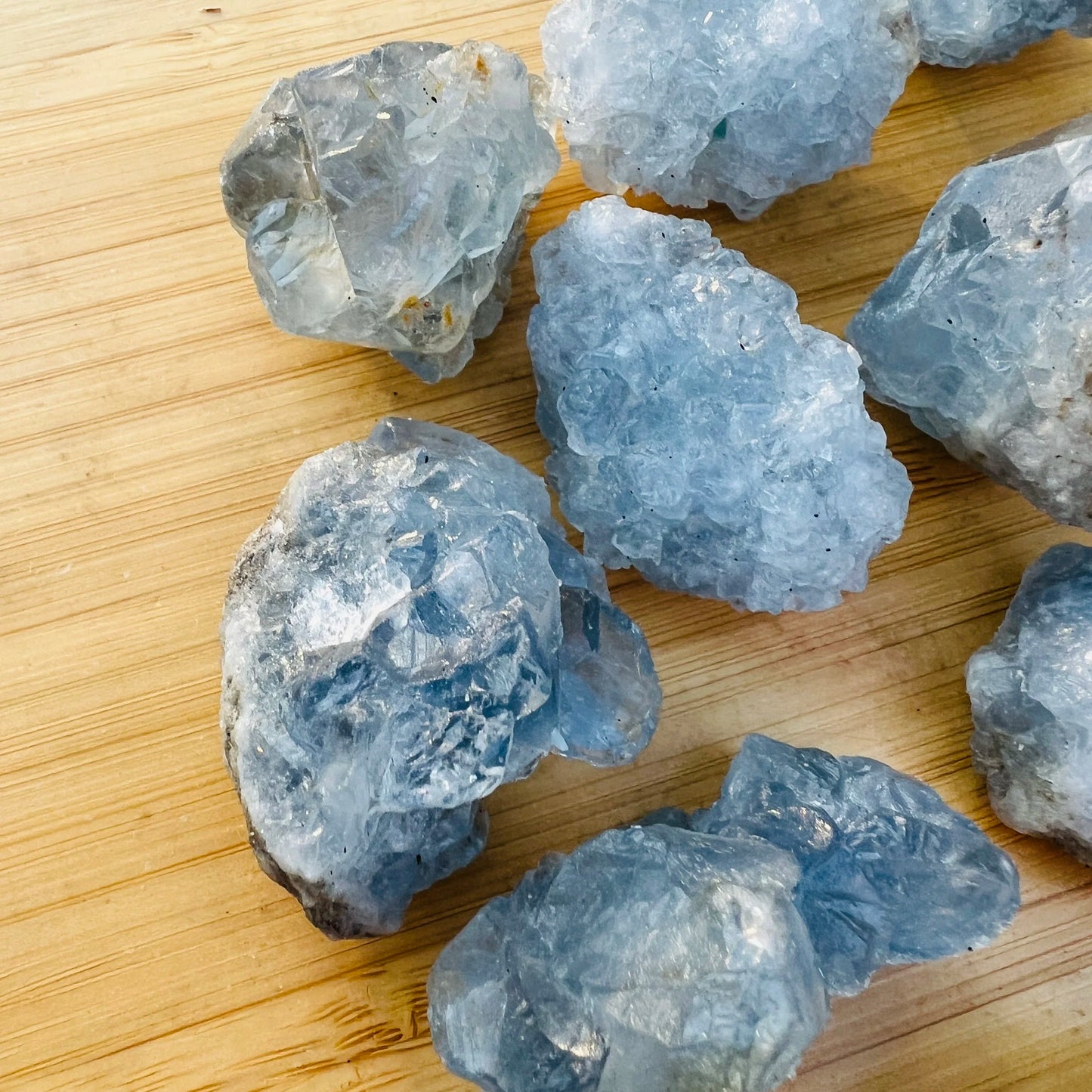 Edge view of Celestite raw stone, showing earthy tone.
