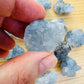 Back view of Grade AA Celestite raw showing natural surface
