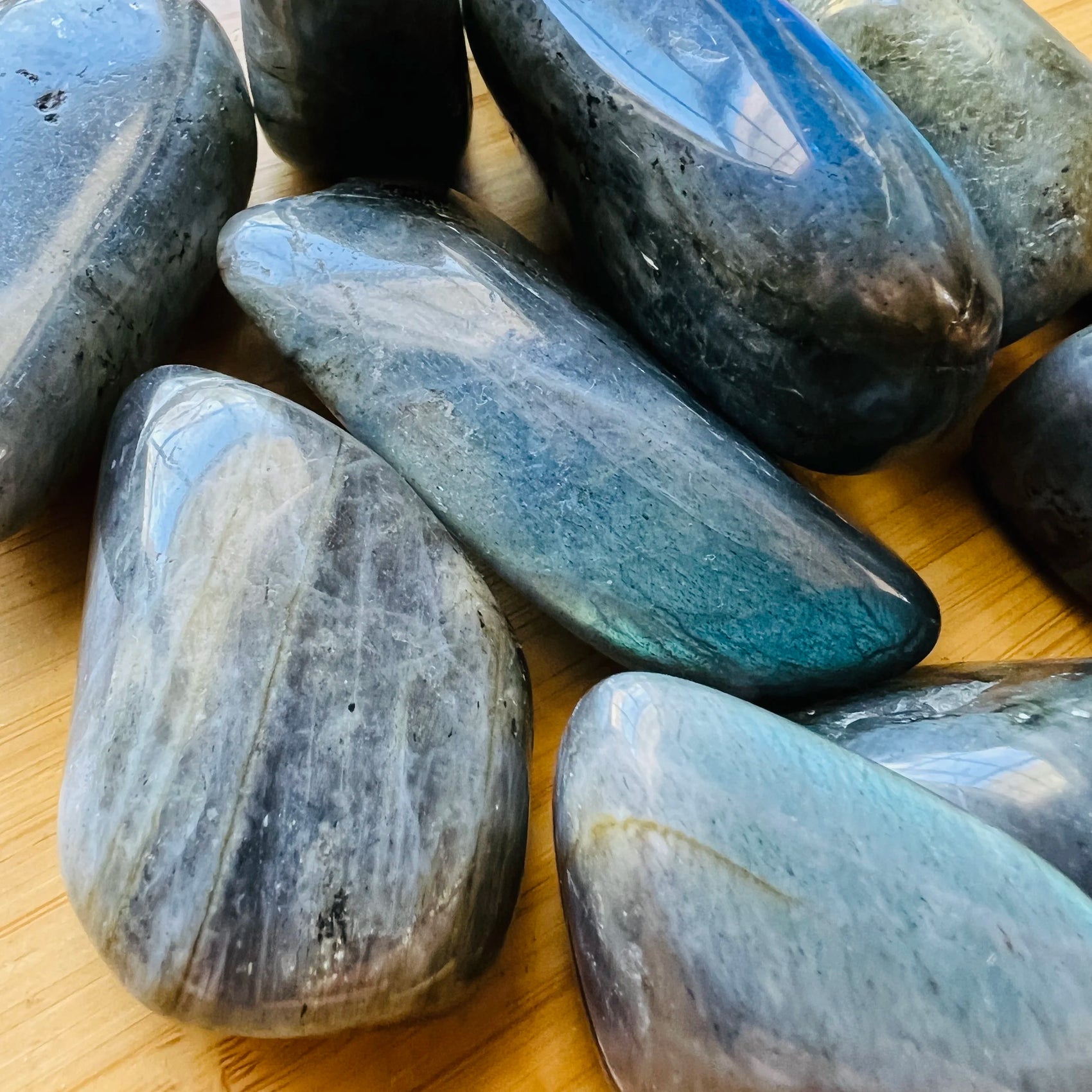 Top view of Labradorite tumbled stone, showing glassy finish, hand-selected from Atsimo-Andrefana, Madagascar.