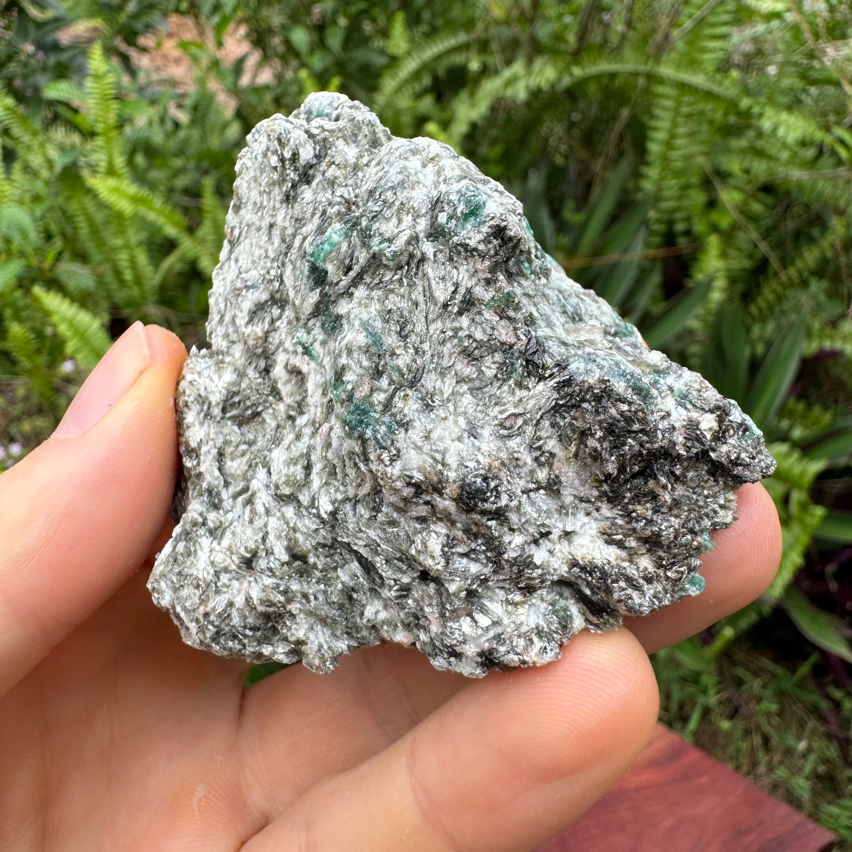 Back view of Grade AA Emerald specimen showing natural surface