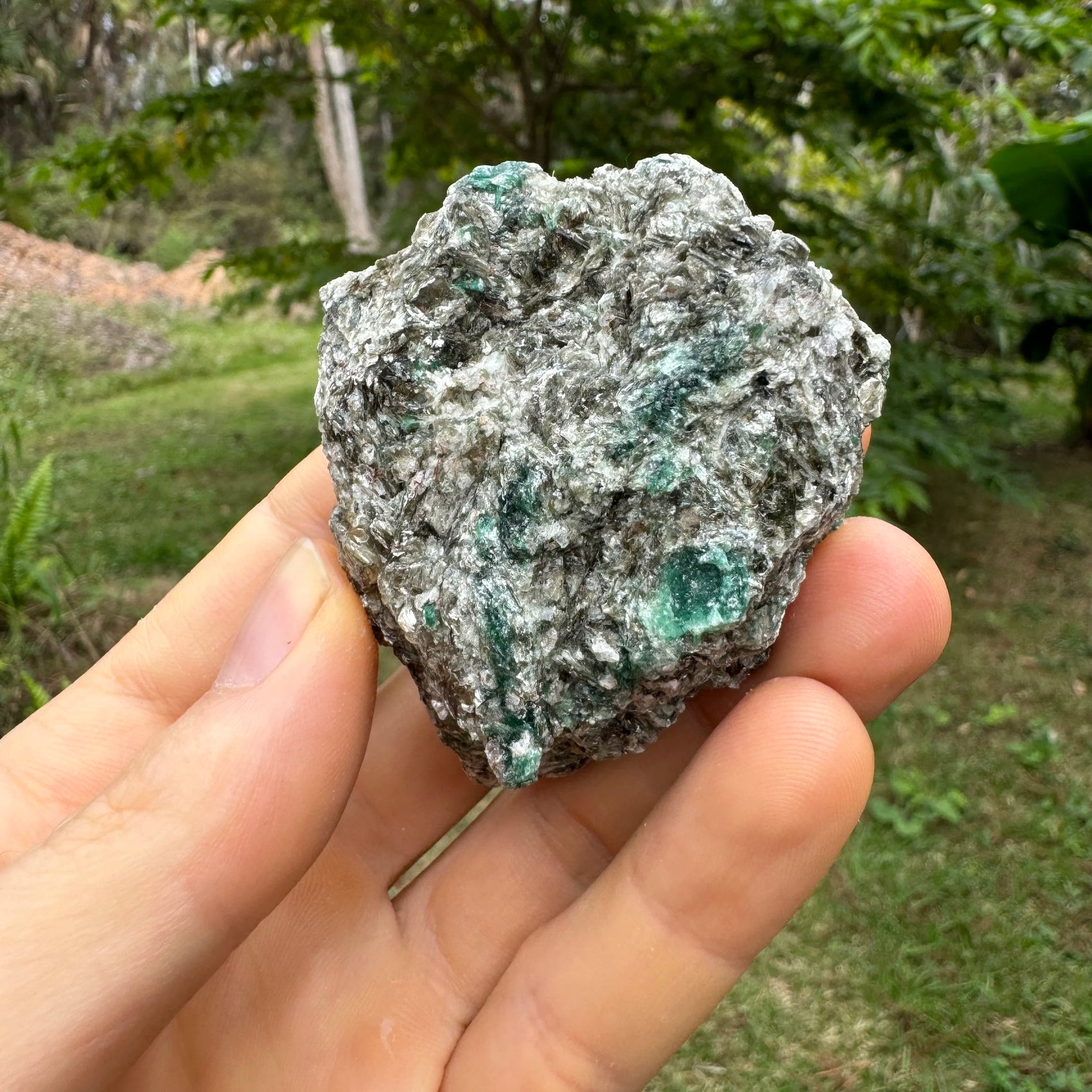 In-hand view of a Emerald specimen, hand-selected from Midlands Province, Zimbabwe.