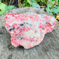 Full profile of Grade AA Rhodonite specimen ready to ship from Beyond Bohemian