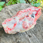 Back view of Grade AA Rhodonite specimen showing natural surface