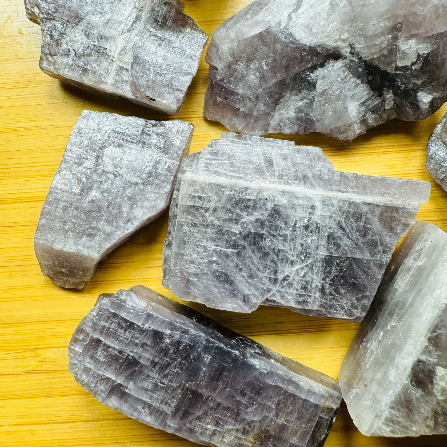 Hand-scale shot of a single Anhydrite raw stone from Androy, Madagascar.