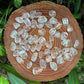 Base detail of Grade AAA Clear Quartz tumbled stone