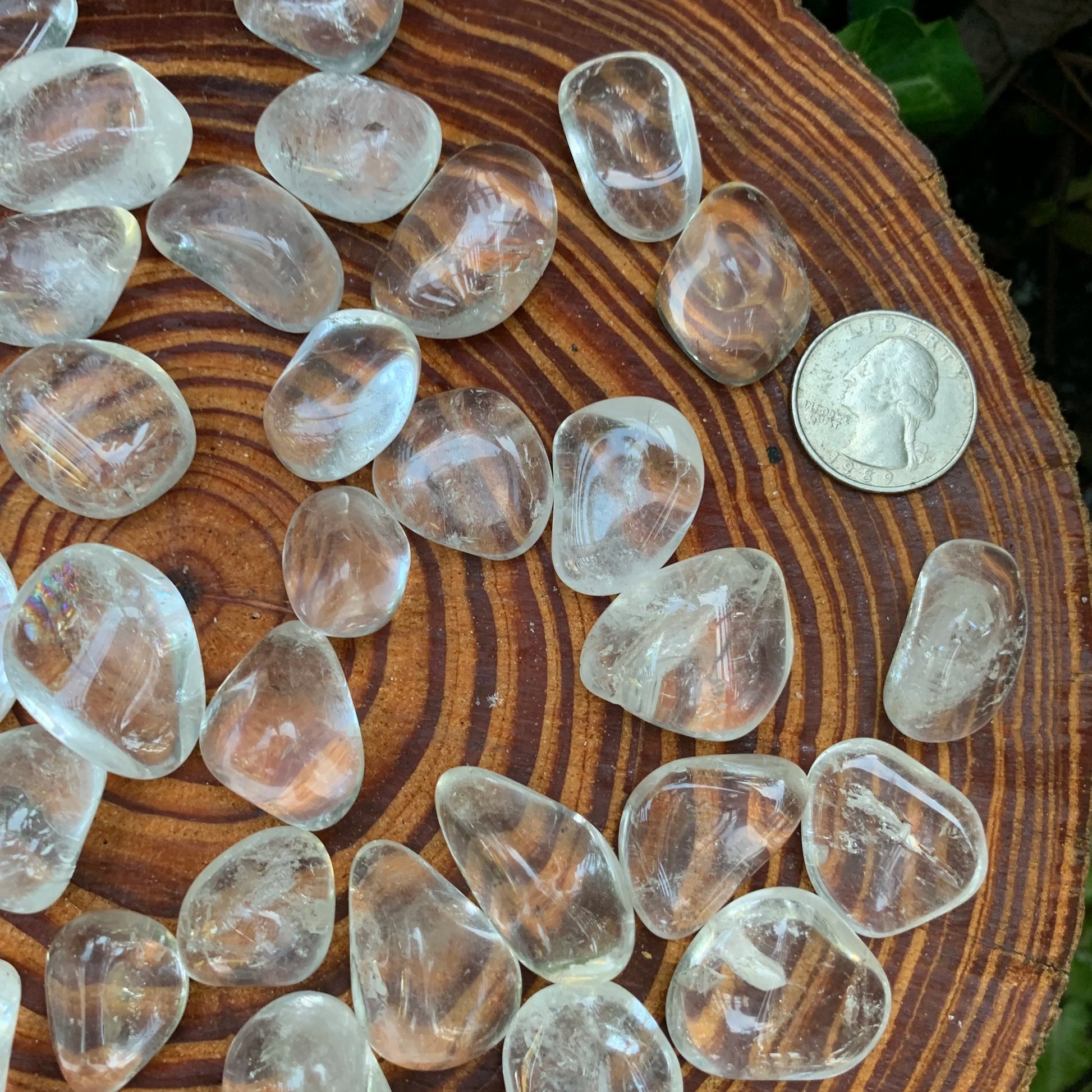 Back view of Grade AAA Clear Quartz tumbled stone showing natural surface
