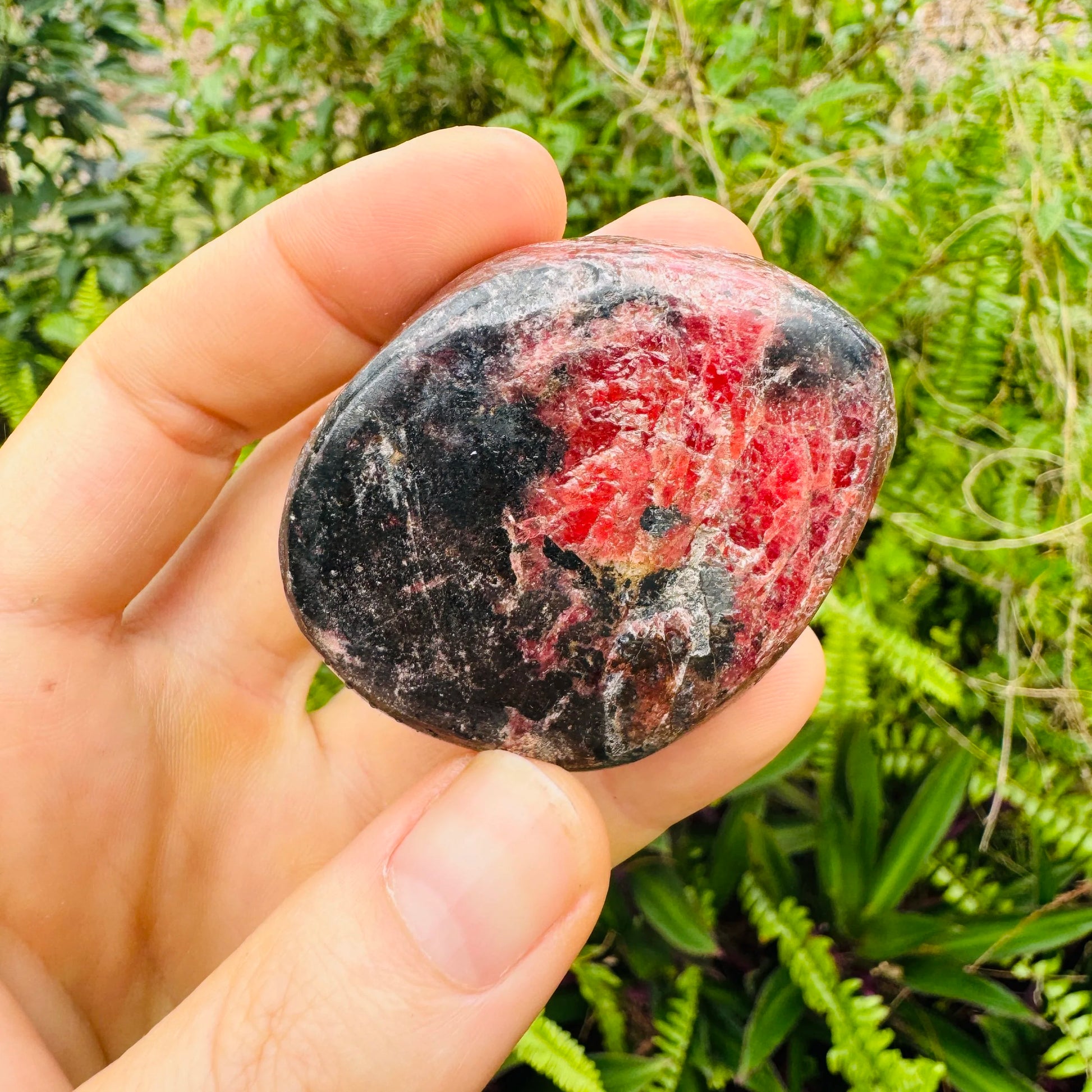 Underside detail of Rhodonite freeform, showing natural variation, sourced from Masvingo, Zimbabwe.