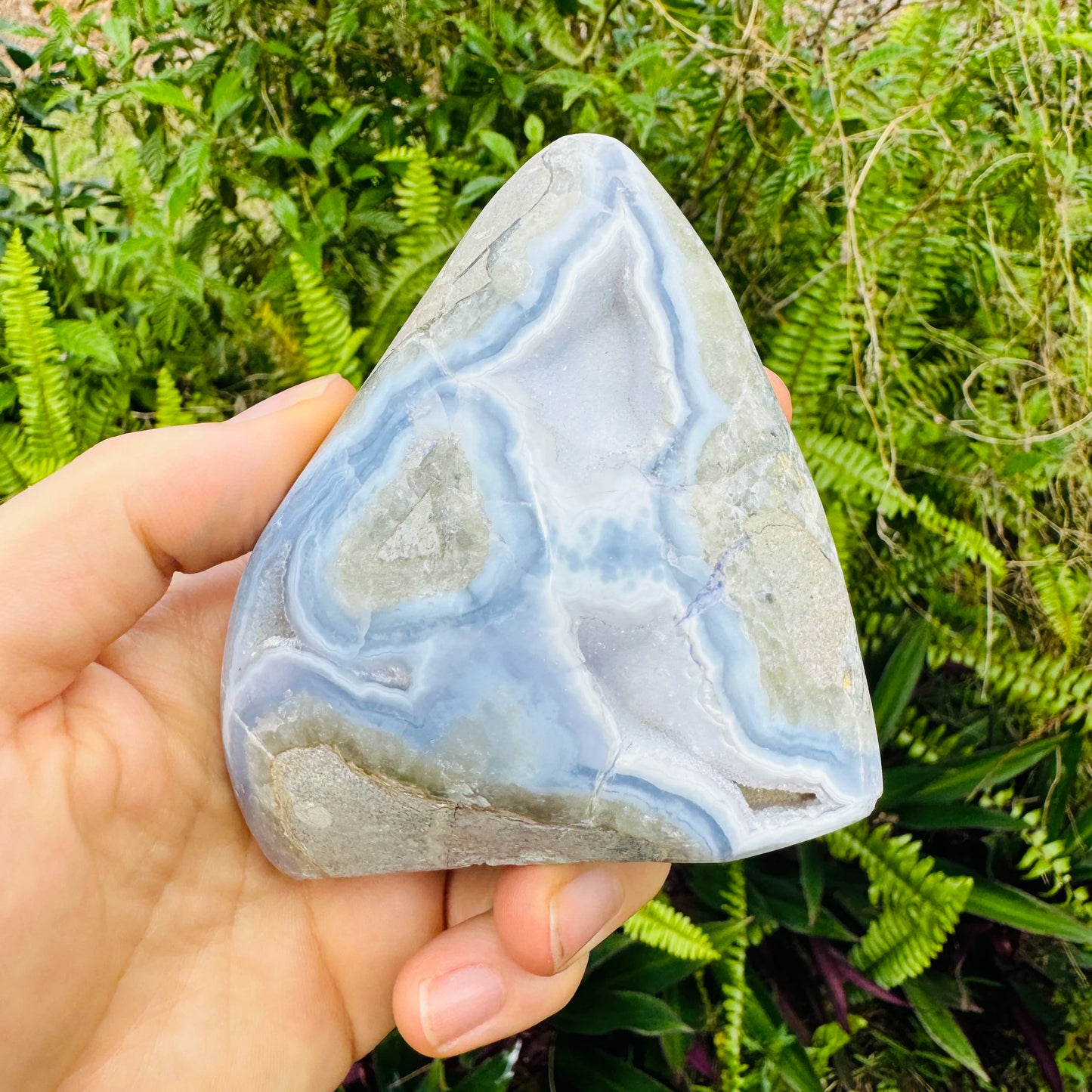 Detail shot of Grade AA Blue Lace Agate freeform under natural light