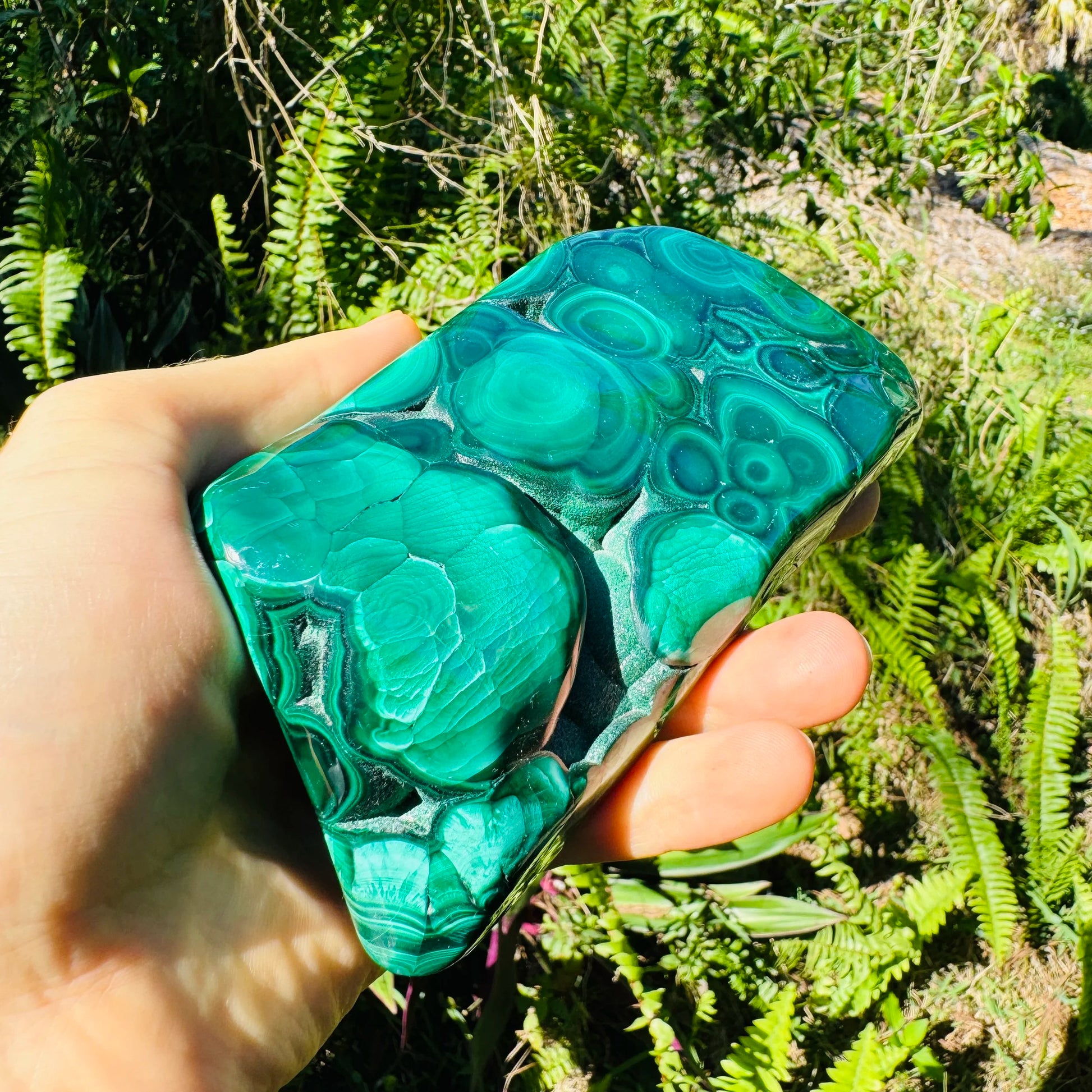 Side perspective of Grade AA Malachite specimen, from Democratic Republic of the Congo.