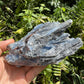 In-hand view of a Blue Kyanite specimen, from Brazil.