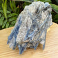 Close detail of Grade AA Blue Kyanite specimen, sourced from Brazil, showing earthy tone.