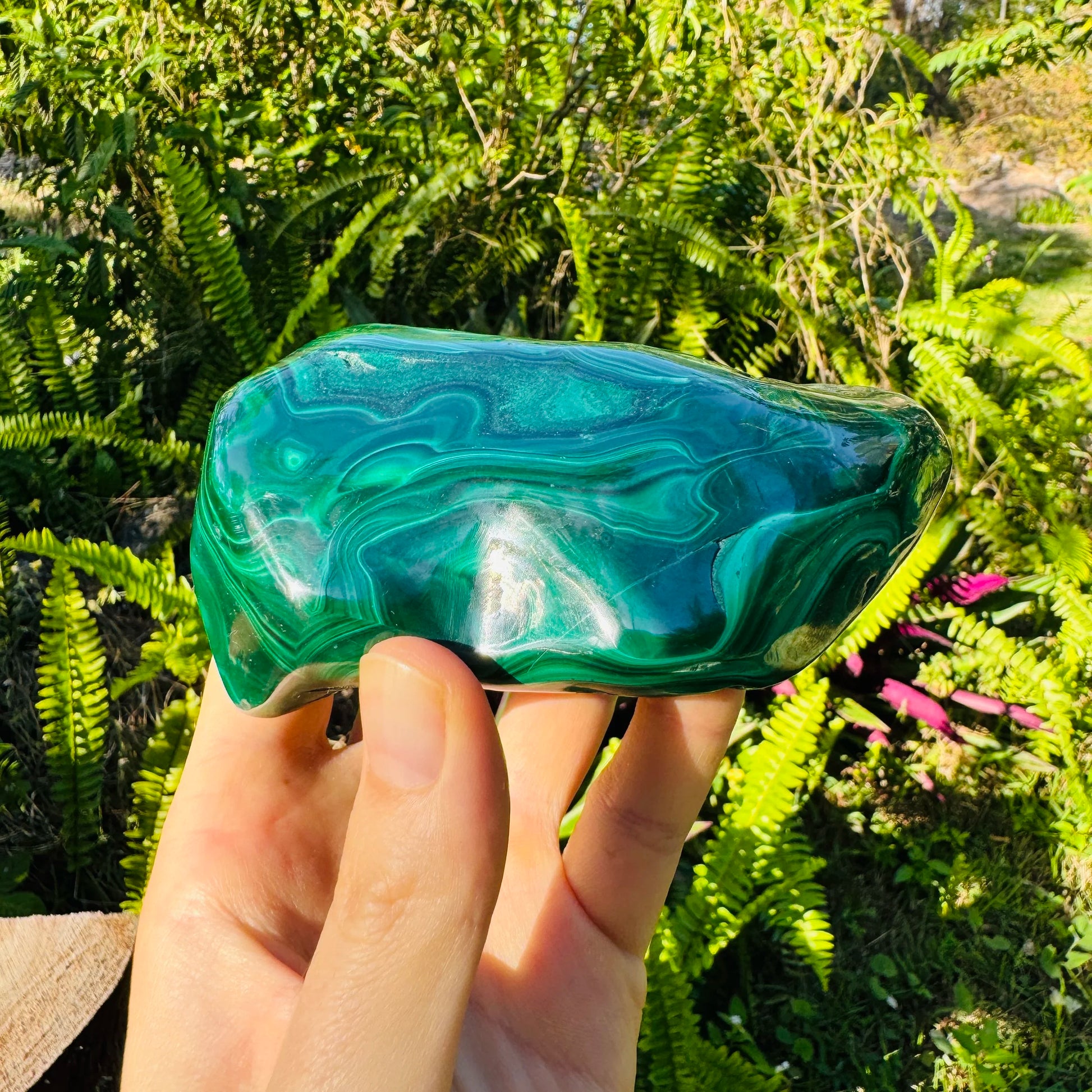 Side perspective of Malachite specimen, Democratic Republic of the Congo-sourced, showing natural texture.