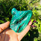 Top view of Malachite specimen, often kept for Emotional Healing, showing natural sheen.