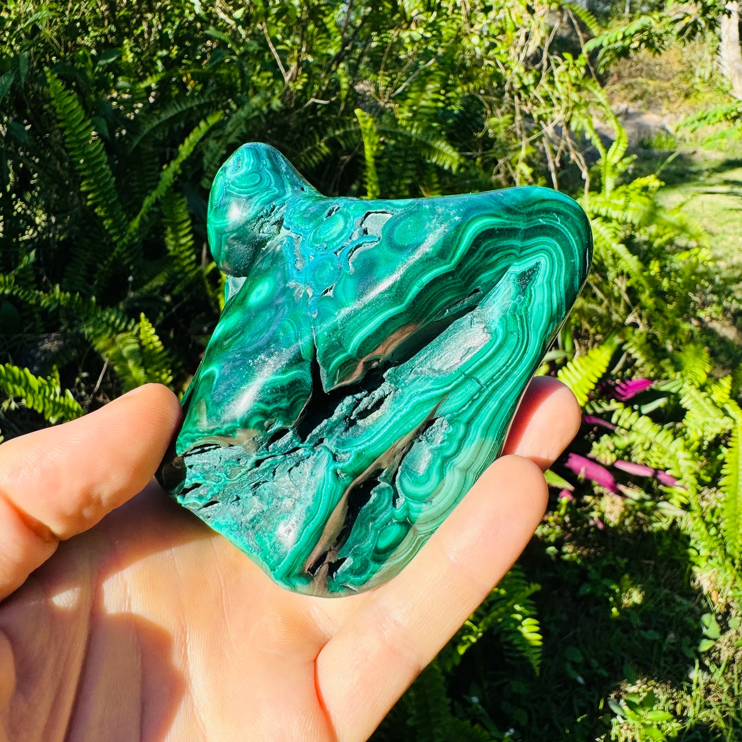 Top view of Malachite specimen, often kept for Emotional Healing, showing natural sheen.