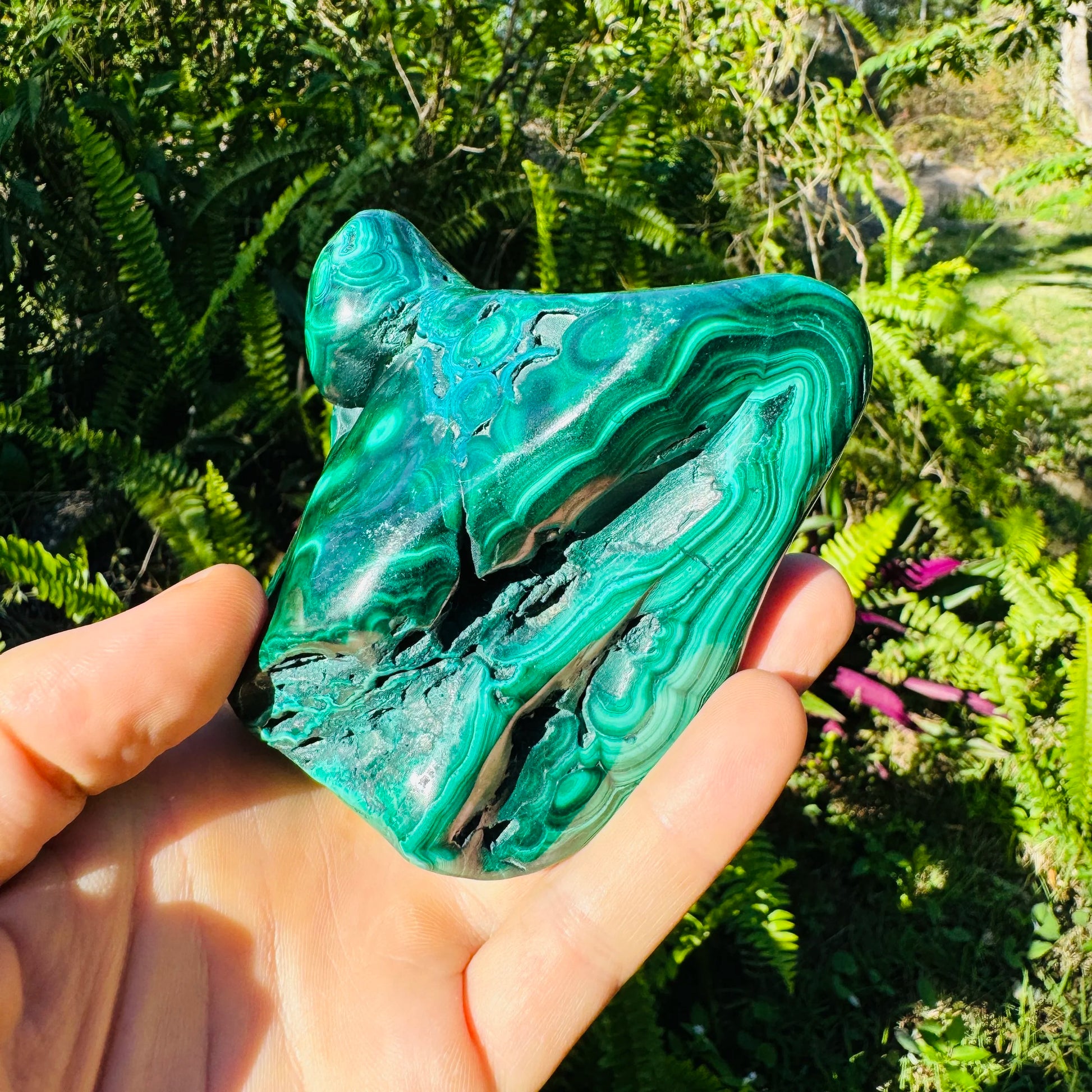 Top view of Malachite specimen, often kept for Emotional Healing, showing natural sheen.