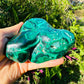 Bird's-eye view of Malachite specimen, often worked with for Emotional Healing, showing raw matrix.
