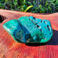 Daylight detail of Malachite specimen, from Haut-Katanga, Democratic Republic of the Congo, showing the piece in repose.