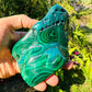 Side angle of Grade AA Malachite specimen, showing natural sheen.