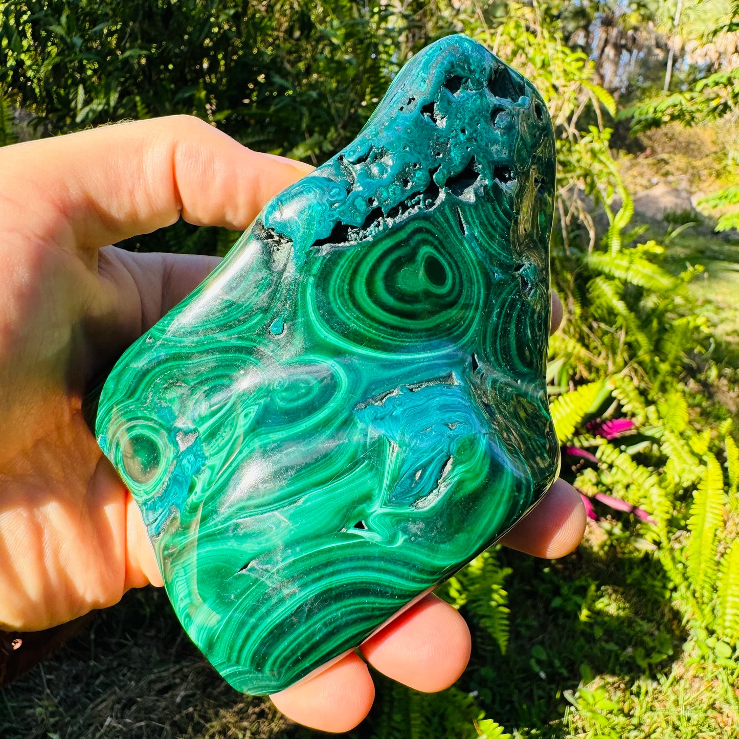 Side angle of Grade AA Malachite specimen, showing natural sheen.