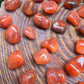 Full profile of Grade AA Carnelian tumbled stone ready to ship from Beyond Bohemian