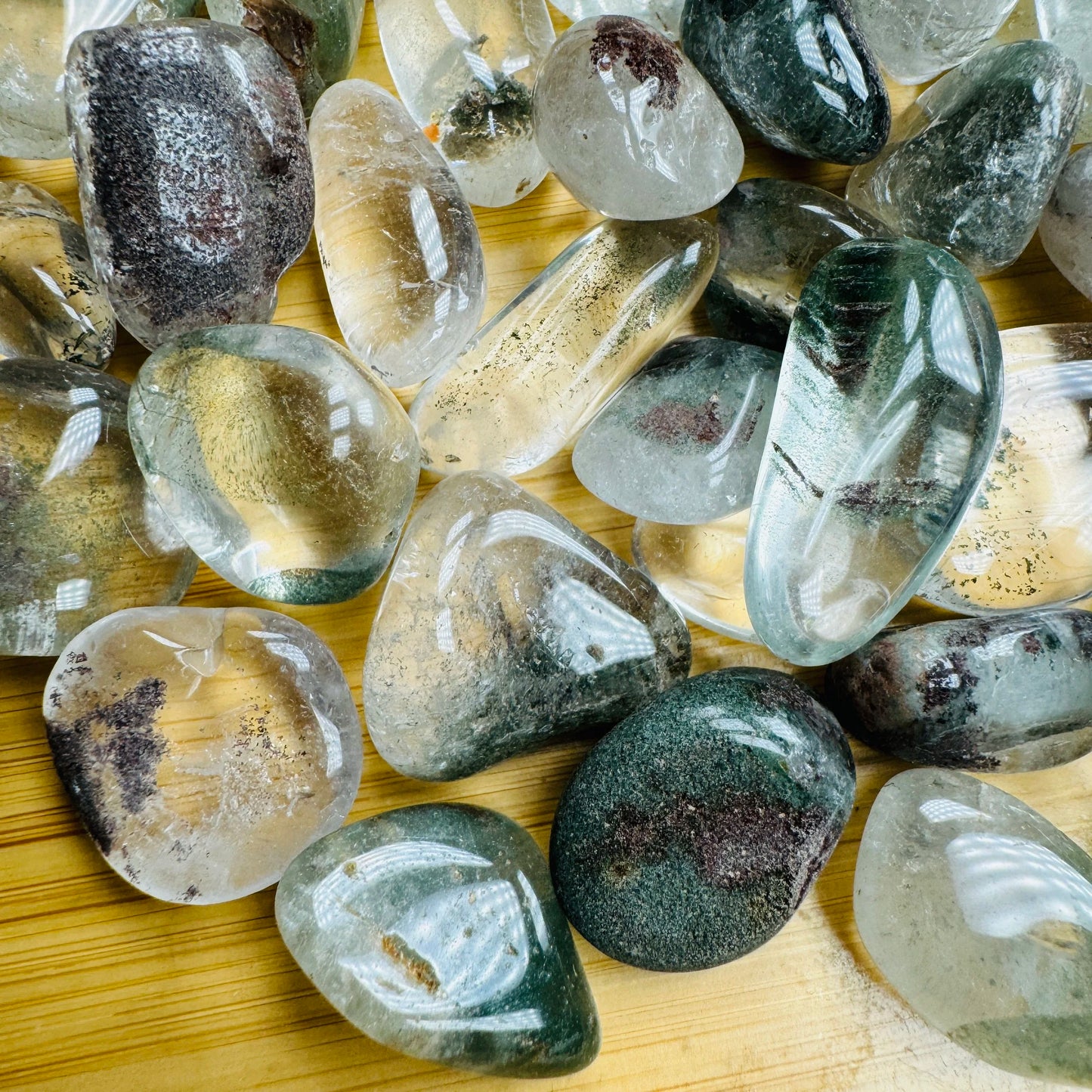 Close detail of Lodolite tumbled stone, showing natural sheen, often kept for Dreaming.
