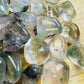 Bird's-eye view of Lodolite tumbled stone, hand-selected from Brazil.