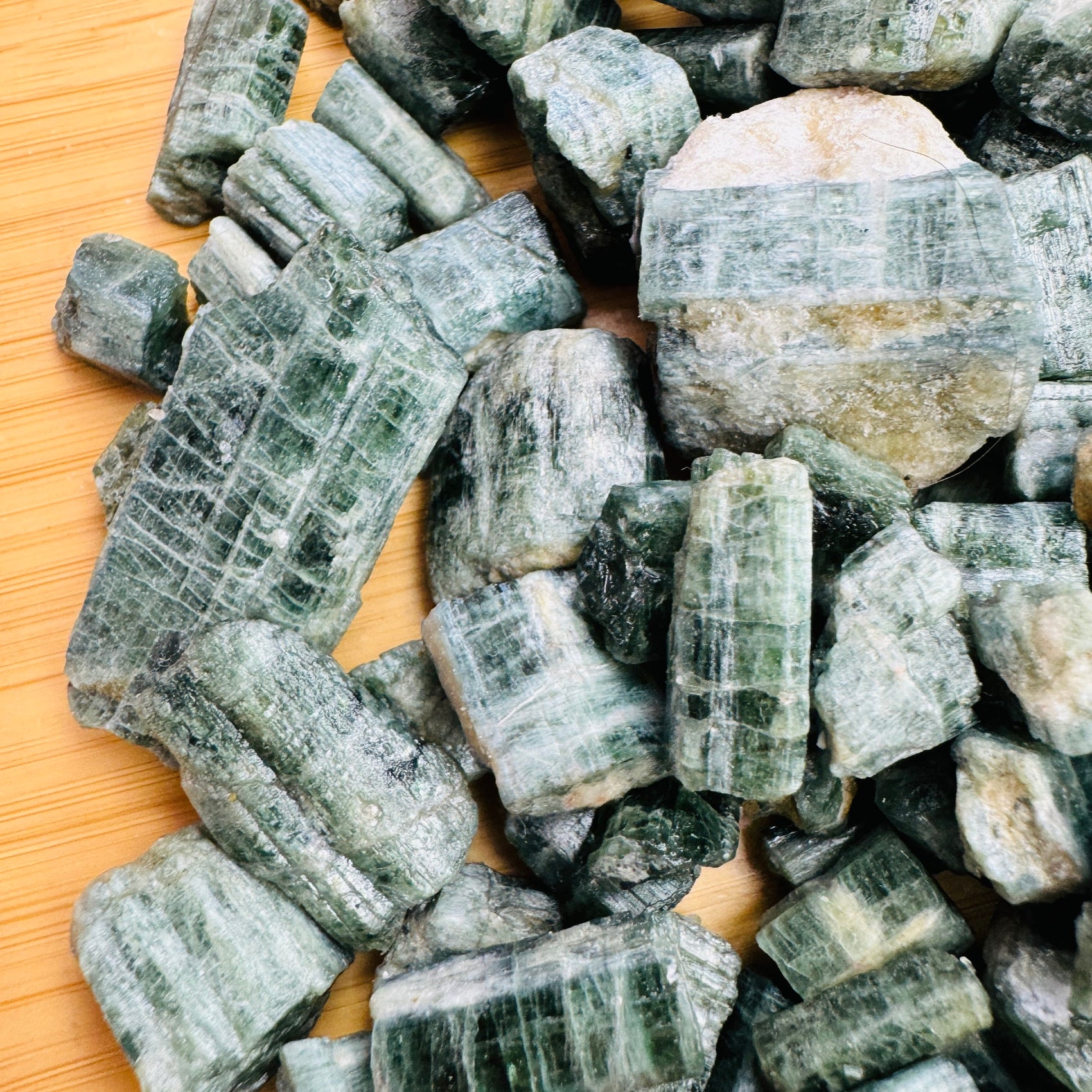 Top angle of Diopside raw stone, often paired with practices around Healing, showing natural inclusions.