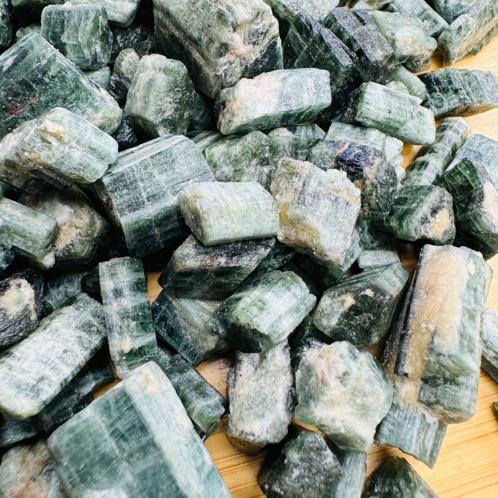 Opposite side of Grade A Diopside raw stone, often worked with for Healing and Love, sourced from Zambia.