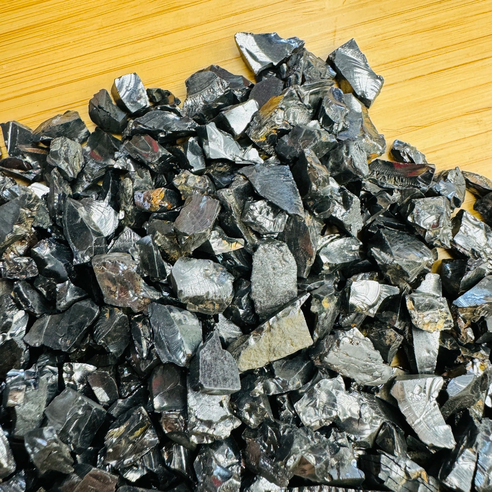 Overhead view of Shungite raw stone, traditionally used for Protection.
