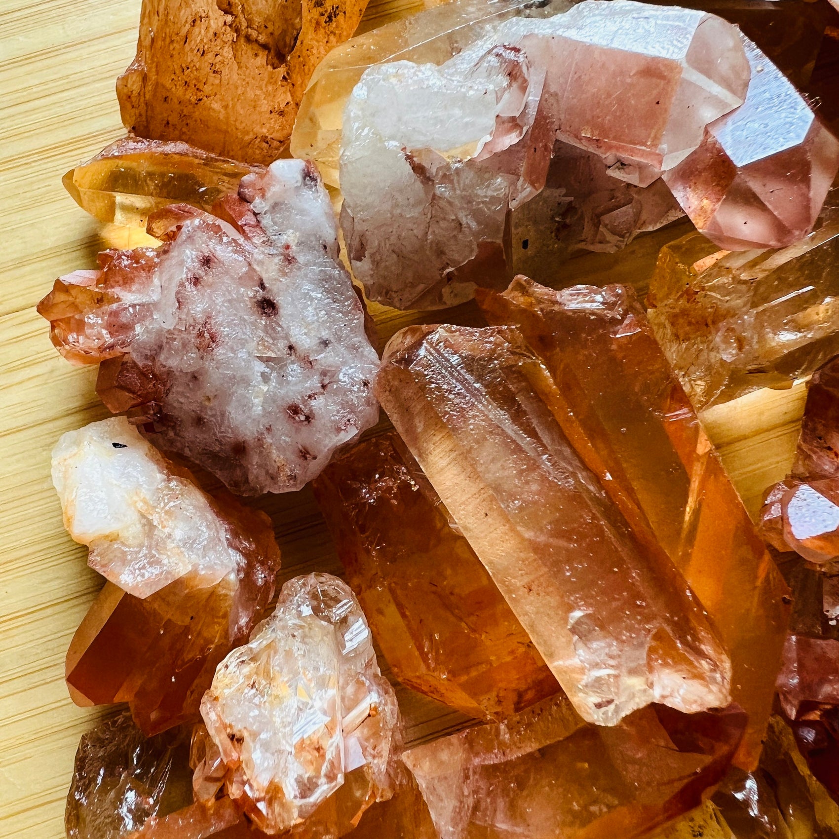Bird's-eye view of orange Tangerine Quartz raw point, showing untreated character.