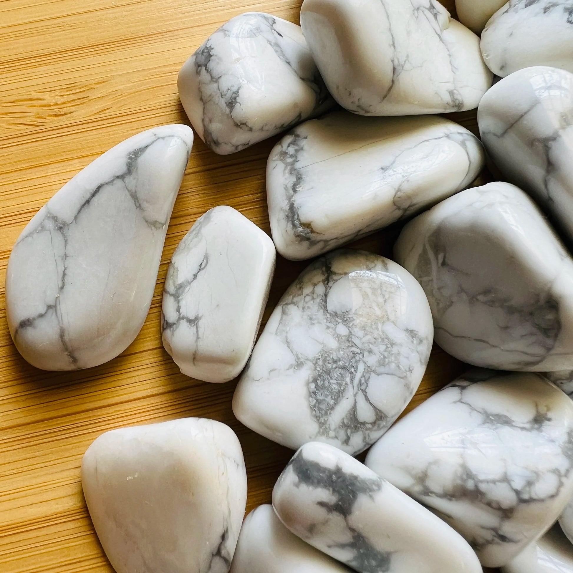 Plan view of Howlite tumbled stone, showing translucent edges.