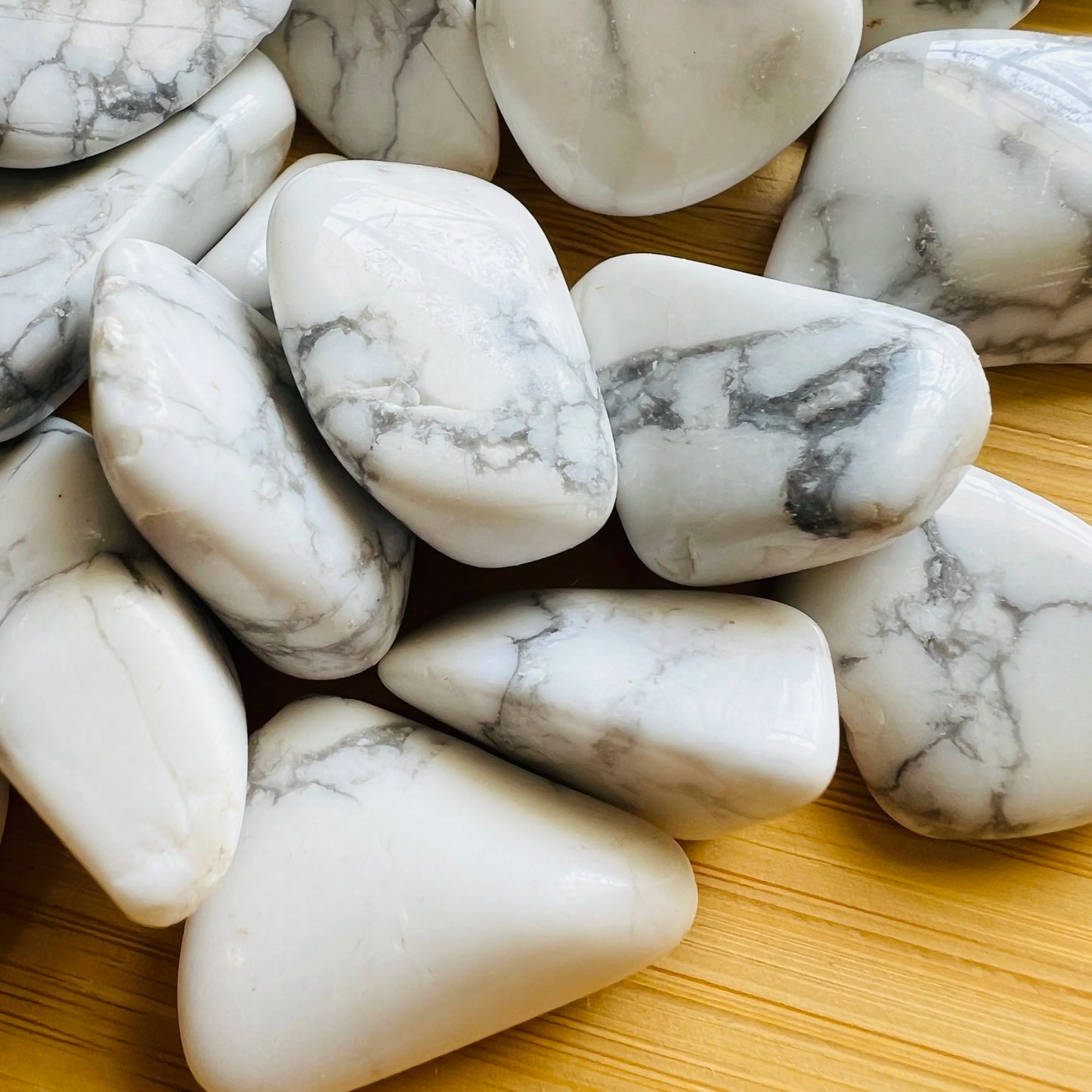 Alternate angle of Grade AA Howlite tumbled stone, kept close for Stress Relief, hand-selected from Masvingo, Zimbabwe.